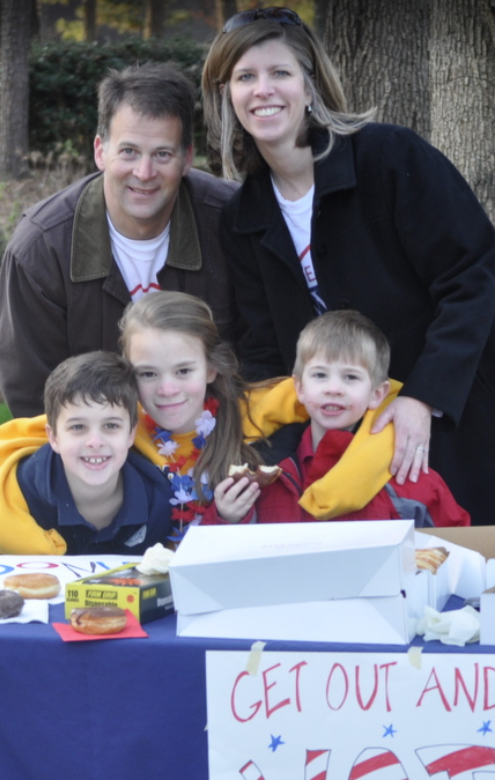 Alex with his family at Get Out and Vote table in 2012