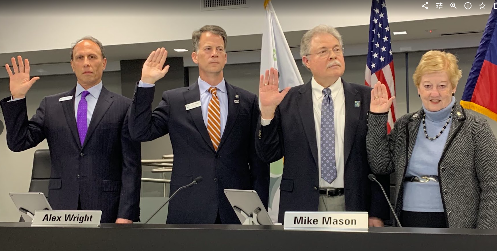 Being sworn in to City Council alongside Mayor Mike Mason